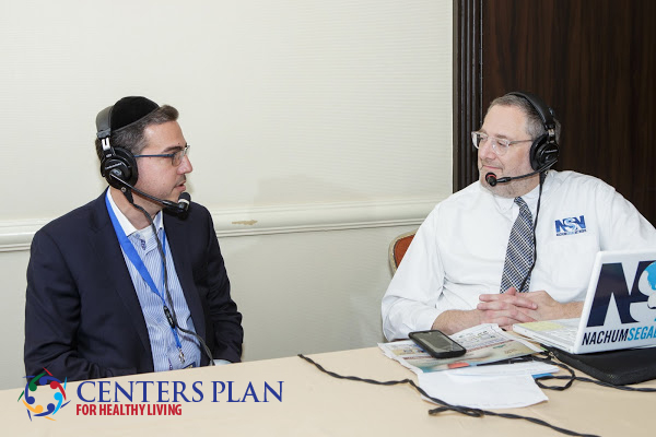 Moshe A being interviewed by Nachum Segal of JM in the AM
